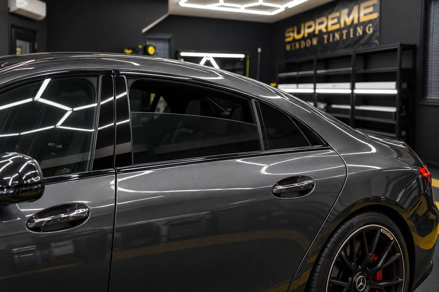 A gray Mercedes-AMG GT in the Supreme Window Tinting studio